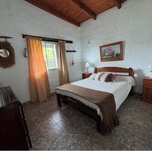 Ένα ή περισσότερα κρεβάτια σε δωμάτιο στο Casas de la Loma