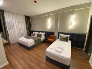 Postel nebo postele na pokoji v ubytování Vion Hotel