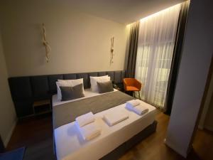 Postel nebo postele na pokoji v ubytování Vion Hotel
