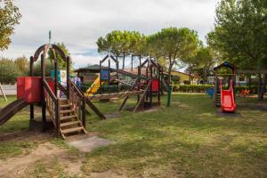 a group of playground equipment in a park at Mobilehomes in Sirmione - Gardasee 22177 in Sirmione