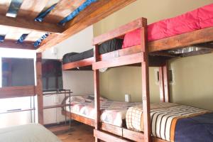a bunk bed room with two bunk beds in it at Qaway in Salta