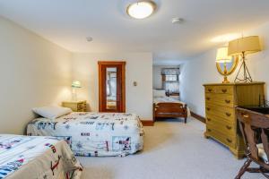 a bedroom with two beds and a dresser at Hickman street 208a in Rehoboth Beach +32 photos