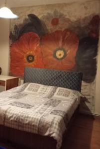 Postel nebo postele na pokoji v ubytování Kolhida home