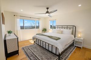 a bedroom with a large bed and a window at Mira Vista Manor in Paso Robles +79 photos