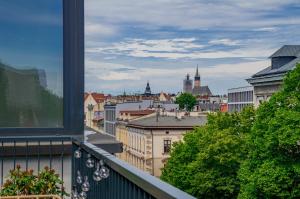 Výhľad na mesto Krakov alebo výhľad na mesto priamo z apartmánového hotela