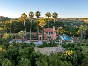 an aerial view of a house with palm trees at Paso Paradiso in Paso Robles
