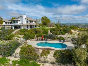 an aerial view of a house with a swimming pool at Mira Vista Heights in Oak Park