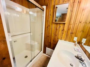 a bathroom with a shower and a sink at Oak avenue 49 in Rehoboth Beach +12 photos