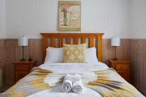 Postel nebo postele na pokoji v ubytování Le Chic Harfang Mont Tremblant