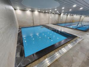 Bazén v ubytování Seogwipo JS Hotel nebo v jeho okolí