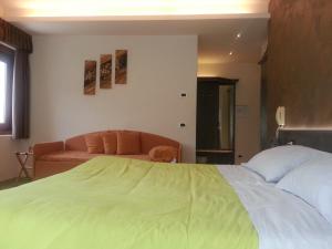 Postel nebo postele na pokoji v ubytování Hotel al Sole