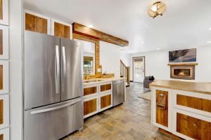 a kitchen with a large stainless steel refrigerator at Village chic chalet #2113 in Big Bear Lake
