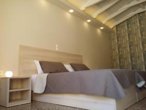 Voodi või voodid majutusasutuse Anetis Hotel toas