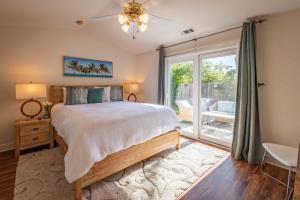Ένα ή περισσότερα κρεβάτια σε δωμάτιο στο Seabreeze Bungalow
