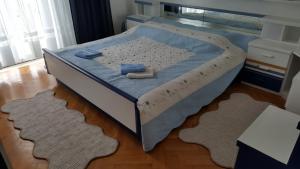Postel nebo postele na pokoji v ubytování Apartment Pavo