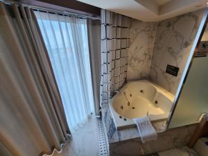 Koupelna v ubytování Seogwipo JS Hotel