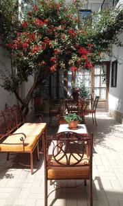מסעדה או מקום אחר לאכול בו ב-Casa de Huespedes Isabella