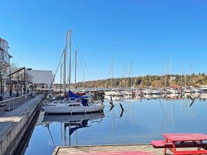 a bunch of boats are docked in a marina at Peaceful Cabin near Furufjall Trail in Spekeröd