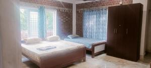 Fotografie z fotogalerie ubytování Five Falls Ramana Villa v destinaci Kuttalam