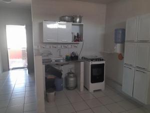Kuchyň nebo kuchyňský kout v ubytování Paz, Sossego & Felicidade em Maceió!