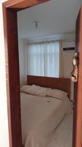 Ένα ή περισσότερα κρεβάτια σε δωμάτιο στο Paraíso no Tabajaras +2 φωτογραφίες