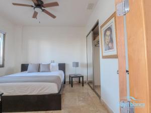 Ένα ή περισσότερα κρεβάτια σε δωμάτιο στο Playa Blanca Premier Unit 109 +21 φωτογραφίες