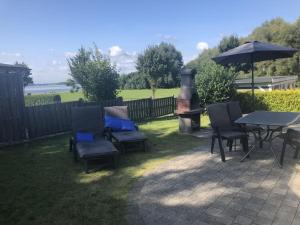 En have udenfor Ferienhaus Seebrise + 15 billeder