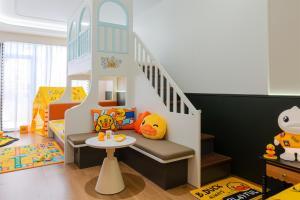 Area soggiorno di Vishan Garden Boutique Hotel 厦门维尚花园潮宿 中山路步行街店