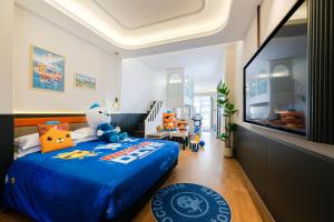 Letto o letti in una camera di Vishan Garden Boutique Hotel 厦门维尚花园潮宿 中山路步行街店
