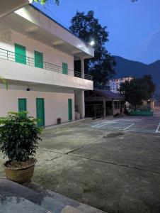 an empty parking lot in front of a building at Seven Homestay in Ha Giang