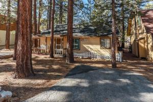 a house in the woods with trees at Pines 23 #1438 in Big Bear Lake
