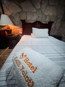 Katil atau katil-katil dalam bilik di Hotel CALLI YOLOTL Teotihuacan