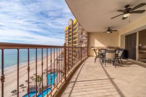 a balcony with a view of the ocean at Viva Beach Life Comfortable Oceanfront in Puerto Peñasco