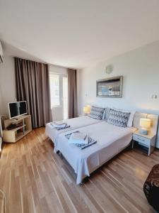 Postel nebo postele na pokoji v ubytování Casa DELL'ARTE
