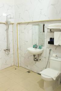 Vannituba majutusasutuses Le Petit Hotel & Travel