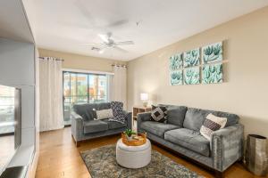 a living room with a couch and a table at Queen Creek #139 Chandler in Chandler