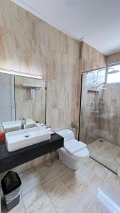Koupelna v ubytování PURNAMA BALIGE HOTEL