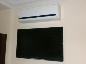 TV a/nebo společenská místnost v ubytování Hotel Columbia