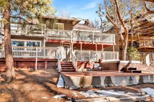 a large house with a deck and a porch at Conklin paradise #1993 in Big Bear Lake