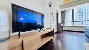 Een TV en/of entertainmentcenter bij 富力公主湾R&F Princess Cove by RongYu
