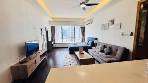 Een TV en/of entertainmentcenter bij 富力公主湾R&F Princess Cove by RongYu
