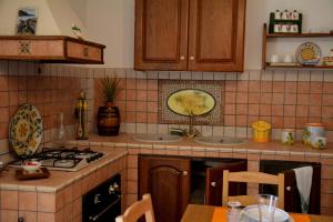 A kitchen or kitchenette at Etna Hiking B&B