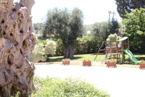 Area giochi per bambini di Hotel Castel Miramonti
