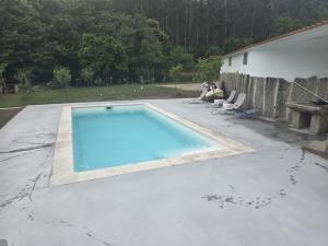 a swimming pool on top of a concrete patio at CASITA RECIEN HABILITADA A ESTRENAR CON PISCINA EN MALVAS Tuy in Malvas +20 photos