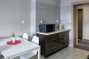 Kuchyňa alebo kuchynka v ubytovaní Hostel Azymut