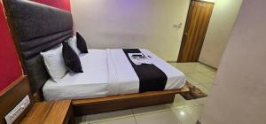 En eller flere senge i et værelse på Hotel Hill View + 2 billeder