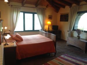 Ein Zimmer in der Unterkunft Bed and Breakfast Il Glicine