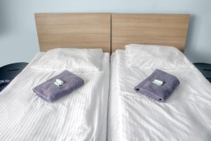 Posteľ alebo postele v izbe v ubytovaní Hostel Azymut