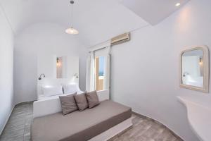 Postel nebo postele na pokoji v ubytování Alizea Villas & Suites