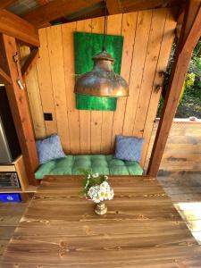 a room with a table in a wooden house at Tree Top Sanctuary Cowichan Valley in Duncan
